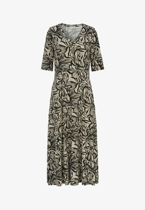 Beige midi-jurk met zwart abstract bloemmotief, V-hals en mouwen tot de elleboog.