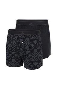 Černé boxerky mají na jednom páru květinový vzor v tmavě šedé barvě, druhý pár je jednobarevný černý, s elastickými pasy nesoucími značku.