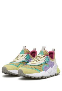 Colorful sneakers featuring mesh and suede in yellow, green, purple, and pink. Textured sole with grip patterns and pull tab on the heel.