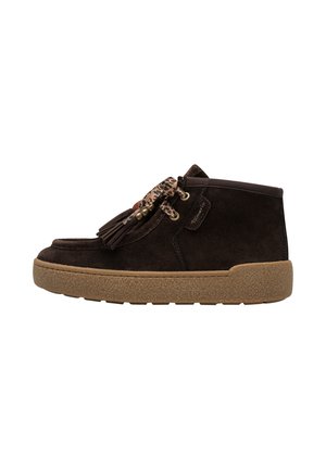 Dark brown suede ankle shoe with thick light brown sole, leopard print lace, and decorative tassels on the front side.