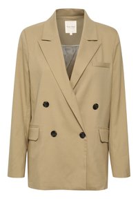 Blazer croisé beige clair avec revers crantés, quatre boutons foncés, poches à rabat, poche poitrine et doublure intérieure grise apparente.