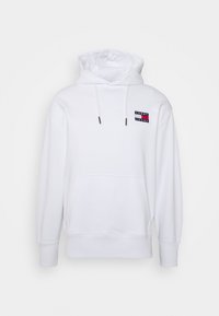 White hoodie with front kangaroo pocket, drawstring hood, and small red, white, and blue Tommy Jeans logo patch on the upper chest.