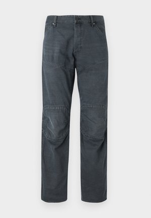 Dark gray cargo pants with a relaxed fit, featuring reinforced knee patches, side pockets, and a button closure. Made from sturdy fabric.