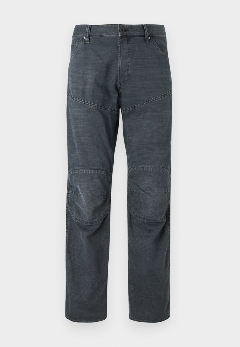 Pantalones cargo de color gris oscuro con un ajuste relajado, que cuentan con parches de refuerzo en las rodillas, bolsillos laterales y cierre de botón. Fabricados con tejido resistente.