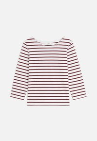 Punainen ja valkoinen raidallinen pitkähihaisotsikko, jossa on venepääntie, valmistettu pehmeästä puuvillakankaasta. T-paidassa on suora helma eikä koristeita.