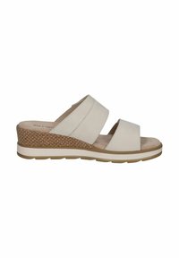 Sandali con zeppa beige, dotati di due cinturini incrociati, una suola testurizzata simile al sughero e un accento testurizzato sul tacco. Dotati di un fondo in gomma.
