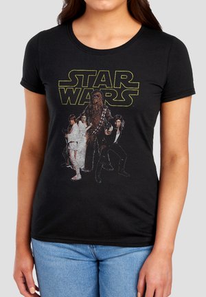 Black t-shirt featuring Star Wars logo and characters Luke Skywalker, Princess Leia, Chewbacca, and Han Solo in action poses.