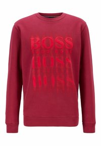 Felpa rossa con logo BOSS testurizzato a diversa opacità. Maniche lunghe e scollatura rotonda con polsini e orlo a costine. Tessuto misto cotone.