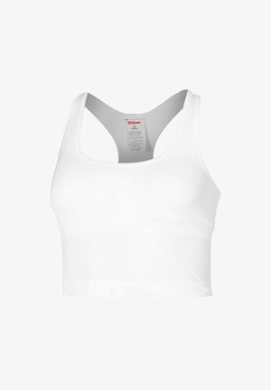 Top corto bianco a costine con spalline larghe e scollo rotondo. Caratterizzato da un orlo rifinito e un'etichetta sulla parte interna della schiena.