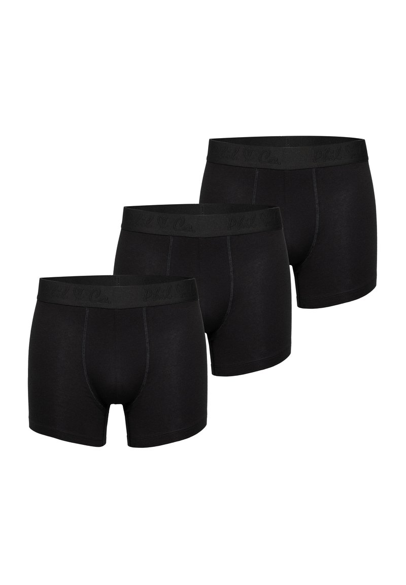 Conjunto de bóxers de algodón negro, que presenta una cinturilla elástica con un discreto logo de la marca, textura suave y un diseño ajustado.