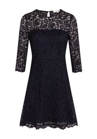Robe en dentelle bleu marine avec des manches trois-quarts, un corsage ajusté, une jupe évasée et des détails en ourlet festonné. Fermeture en goutte d'eau au dos.