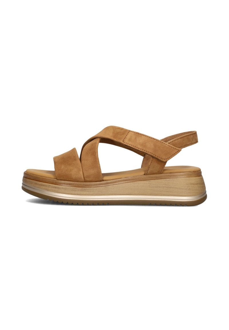 Bruine suède wedge sandalen met kruislingse bandjes, een gevoerd voetbed en een gestructureerde rubberen zool. Het verhoogde ontwerp verhoogt het comfort en de ondersteuning.