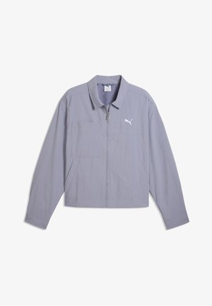 Giacca con zip color lilla chiaro con colletto, due tasche frontali, motivo a griglia sottile e logo Puma bianco sul petto.