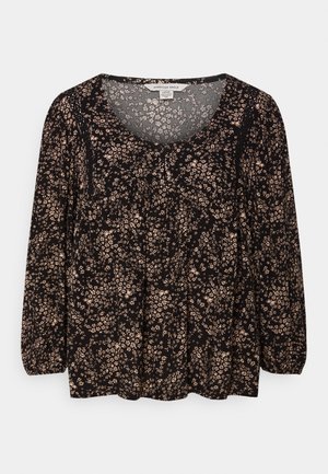 Musta pitkähihaisen pusero, jossa vaaleanpunainen kukkakuvio, pyöreä kaula-aukko ja hienovaraiset etulaskokset.