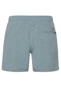 Lyseblå herre badebukser med elastisk talje og lynlåslomme bagpå på højre side.