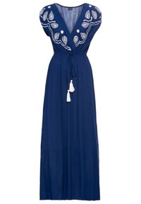 Robe maxi bleu marine avec encolure en V, ornée de motifs brodés blancs et de détails à pampilles à la taille. Fabriquée en tissu léger.