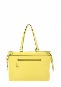 Sac fourre-tout en cuir jaune avec bordure noire, doté de deux bretelles, d'une poche zippée à l'avant et d'une texture lisse. Comprend des cordons de serrage latéraux ajustables.