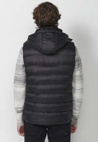 Koroshi Strukirani kaput - black