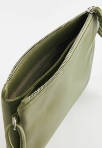 Next Taška cez plece - sage green