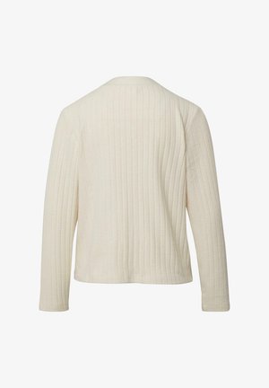 Kremowy top z długim rękawem o pionowej, prążkowanej fakturze, zaokrąglonym dekolcie i luźnym kroju. Bez widocznych zapięć ani ozdób.