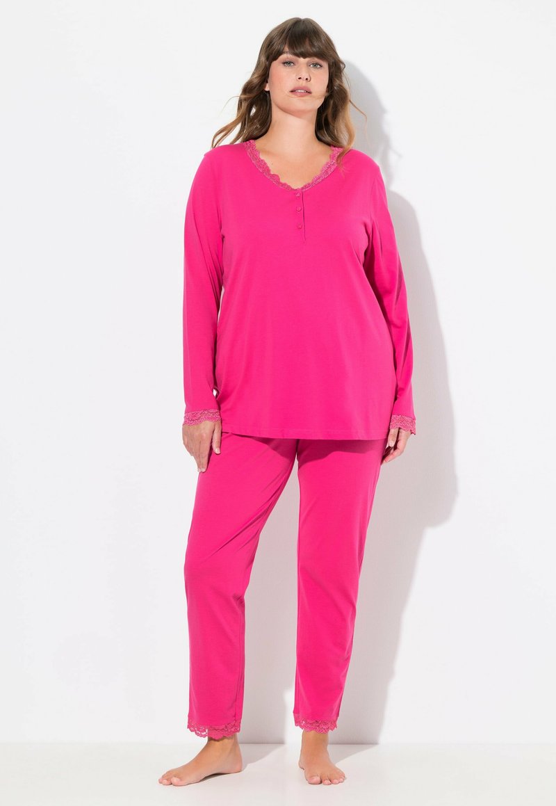 Rosa langärmliges Pyjama-Set mit einem V-Ausschnitt und Bündchen aus Spitzenbesatz, dazu passende Hosen mit Spitzenakzenten am Saum.