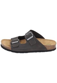 Black leather slip-on sandal with two adjustable buckle straps, cork footbed, and textured rubber sole. Simple and ergonomic design.