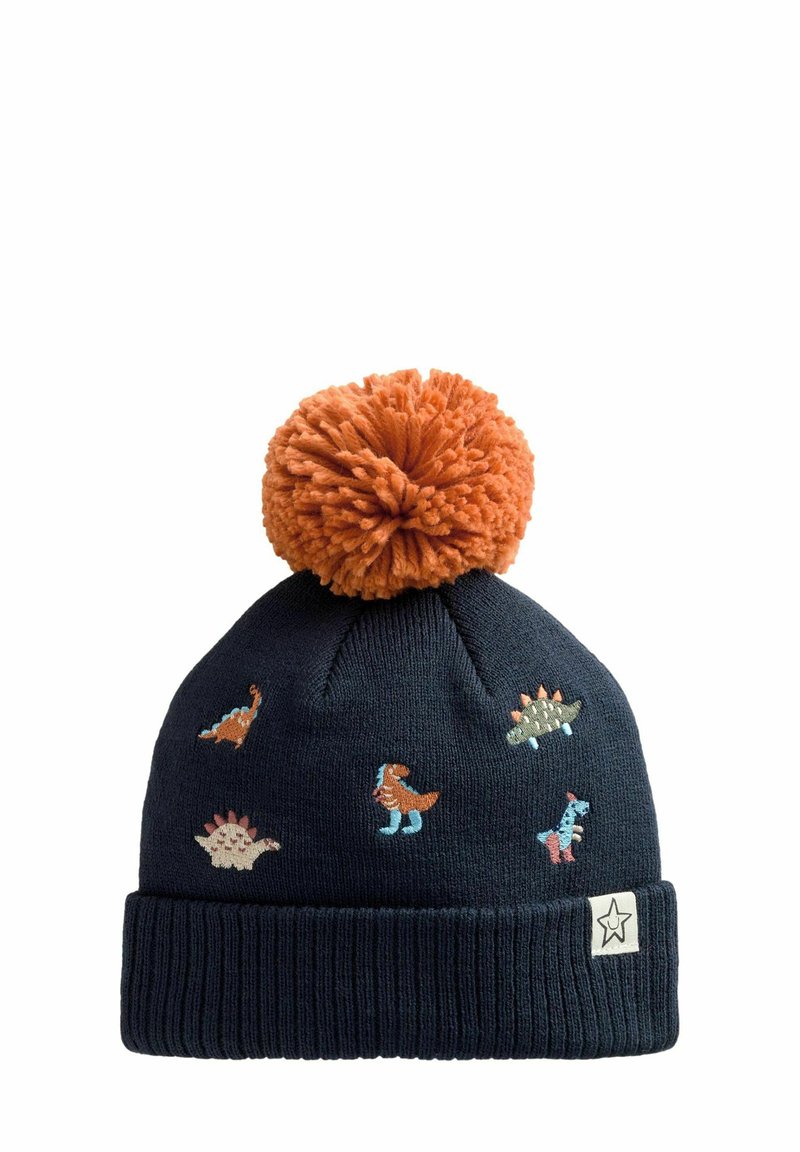 Marineblauer Strickmütze mit orangefarbener Bommel und gestickten bunten Comic-Dinosauriern auf der Vorderseite, mit einem Stern-Logo-Tag am Umschlag.