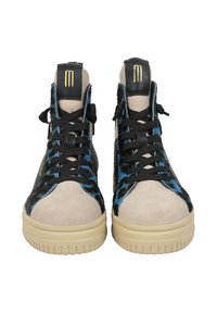 High-top sneakers with a black and blue fur upper, beige suede toe cap, black laces, and yellow accent on the tongue. Grooved rubber sole.