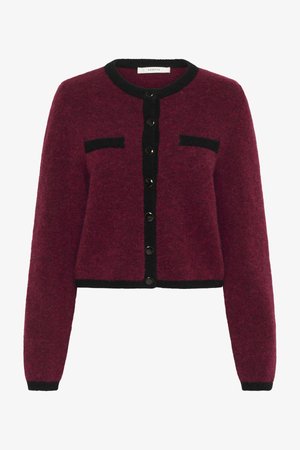 Burgundy wool cardigan with black trim, featuring a round neckline, front button closure, and two chest pockets. Textured finish.
