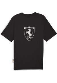 Sort bomulds t-shirt med et stort sølv Ferrari-logo på ryggen. Korte ærmer og en afslappet pasform med en rund halsudskæring.