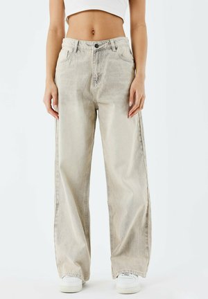 Lichtbeige wijde jeans van denim, met een hoge taille, een knoopsluiting aan de voorkant en twee zijzakken.