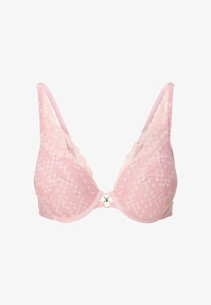 Růžový krajkový podprsenka s vzorem houndstooth, s hlubokým výstřihem, zvlněnými krajkovými okraji a zlatým kovovým detailem vpředu.