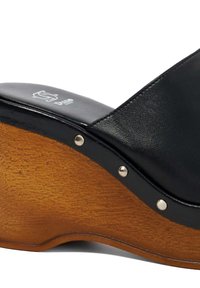 Black leather wedge sandal with wooden sole, featuring metallic studs along the edge; smooth texture and curved design.