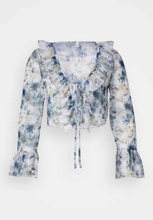 Lilledega pikkade varrukatega pluus, mis on valmistatud läbipaistvast kangast, sisaldab volangidega kaelust, sidumisfunktsiooni ja kellukese varrukad pehmetes sinistes ja valgetes toonides.