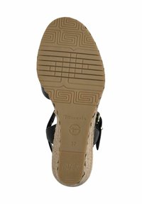 Sandalo wedge nero con una intersuola in juta intrecciata. La suola in gomma presenta un motivo a trama geometrica. Marcato con "Tamaris" e taglia 37.