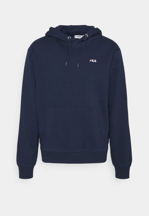 Mörkblå huvtröja i bomull med framfickor i modell känguru, dragsko i huvan och liten logga på bröstet. Mjuk textur, ribbade muddar.