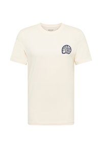 Cream-colored cotton t-shirt with short sleeves and a crew neck. Features a blue graphic logo on the left chest area.