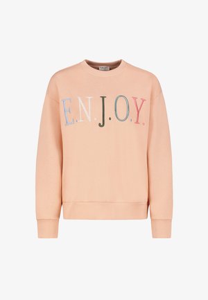 Pfirsichfarbener Sweatshirt mit Rundhalsausschnitt, gerippten Bündchen und Saum. "EN.J.O.Y." in bunten Buchstaben auf der Brust gedruckt. Weiche Textur.