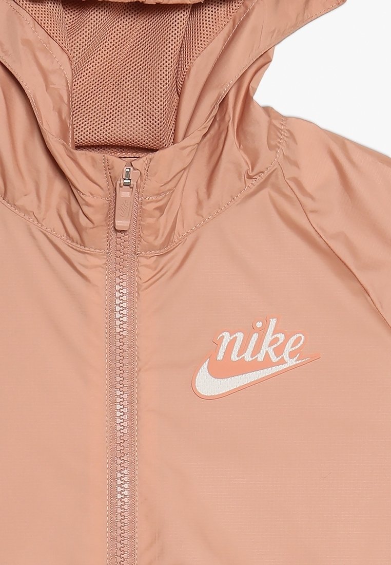 nike rose gold windbreaker