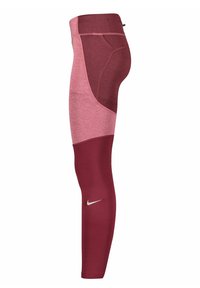 Burgundy och rosa leggings med en åtsittande design. Har färgblockering och en Nike-swoosh-logga på den nedre delen av benet. Tillverkad av stretchigt tyg.