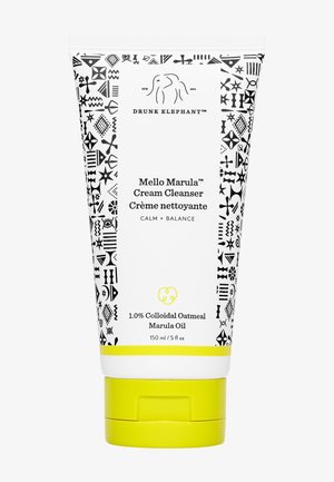 Mello Marula™ Cream Cleanser in a white tube featuring black abstract patterns, yellow cap. Contains 1.0% colloidal oatmeal and marula oil. 150ml.