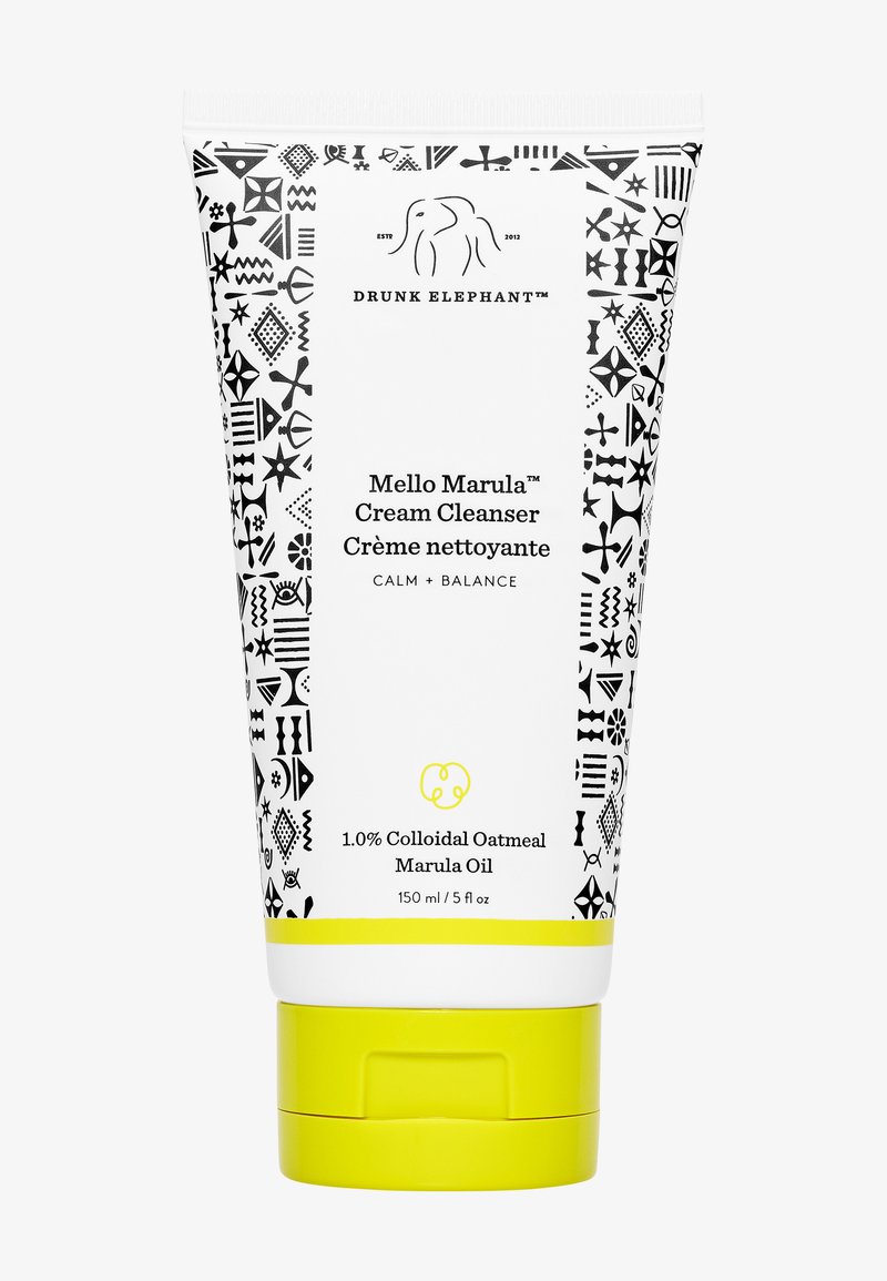 Mello Marula™ Cream Cleanser in a white tube featuring black abstract patterns, yellow cap. Contains 1.0% colloidal oatmeal and marula oil. 150ml.