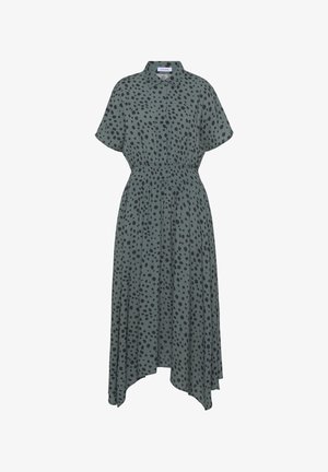 Zaļš midi kleita ar melniem punktiņiem, īsām piedurknēm, apkakles kaklu, elastīgu jostasvietu un asimetrisku apakšmali. Izgatavota no viegla auduma.