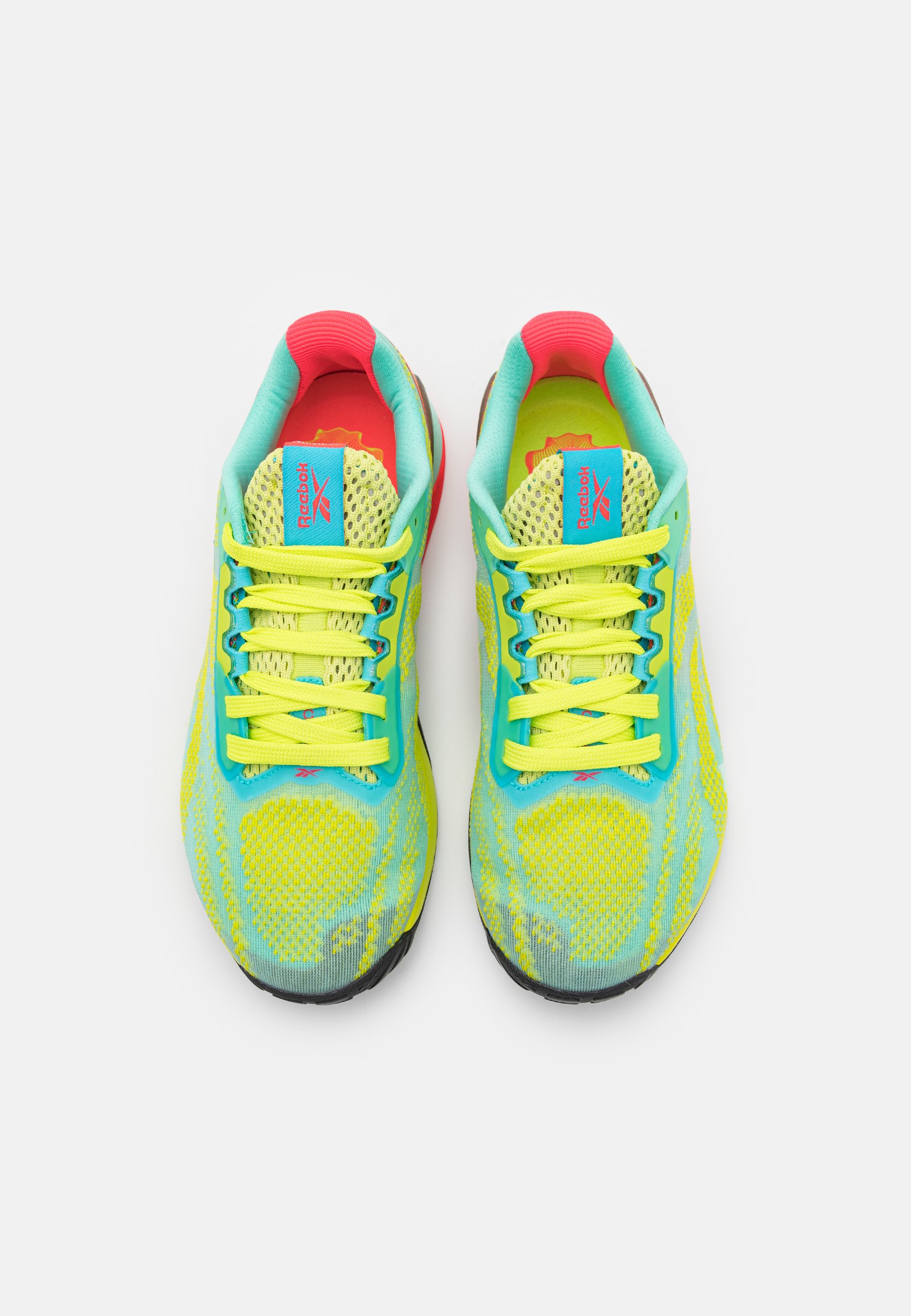 reebok green sports shoes