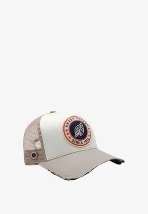 Casquette avec un devant blanc, un dos en mesh beige, et un patch rond avec un motif de feuille aux accents rouge et bleu. Bord de la visière avec un aspect effiloché visible.