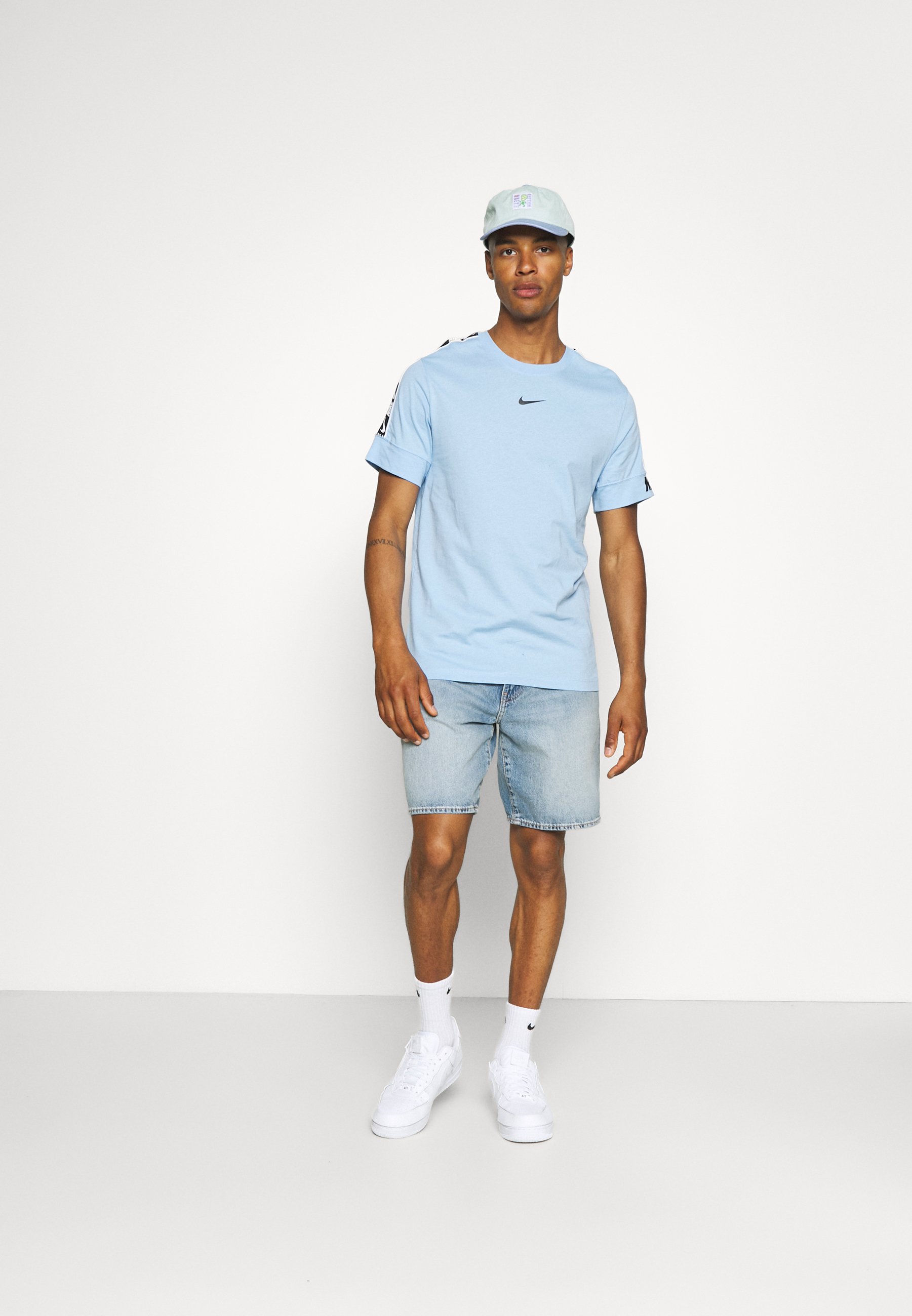 light blue nike top