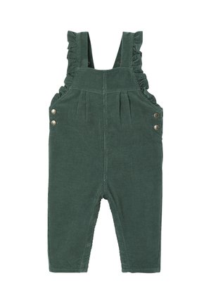 Grüne Corduroy-Latzhose mit Rüschenträgern, Vorderfalten und Druckknopfdetails an den Seiten. Glatte Textur.