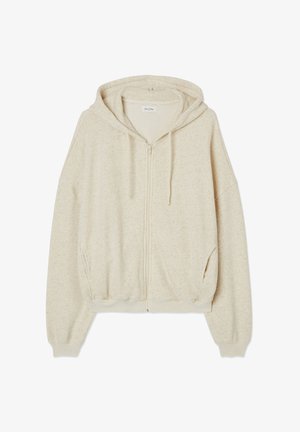 Bež kapuutsiga jakker tehtud pehmest tekstuurist kangast, millel on mugav lõige, suur kapuuts ja eesmine taskud. Toote omadusteks on elastsed varrukate ja allääre sooned.