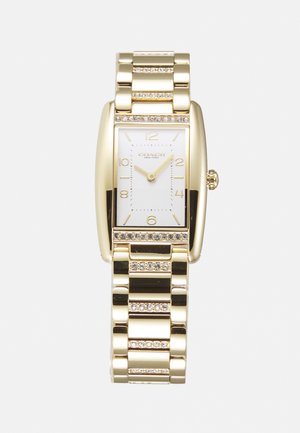 Armbanduhr in Goldfarbe mit rechteckigem Zifferblatt, weißem Zifferblatt und goldenen Akzenten. Verfügt über ein Gliederarmband mit klaren Steinen und traditionellen Stundenmarkierungen.