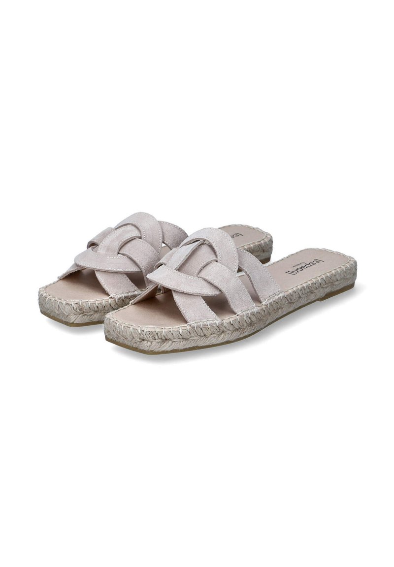 Flat slip-on sandals with a soft beige suede upper, features woven straps and a jute-wrapped sole, providing a casual aesthetic and texture.